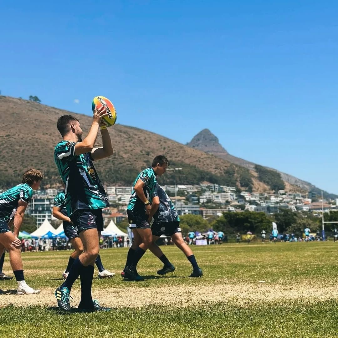 A Royal Raptors lineout with Lion's Head behind